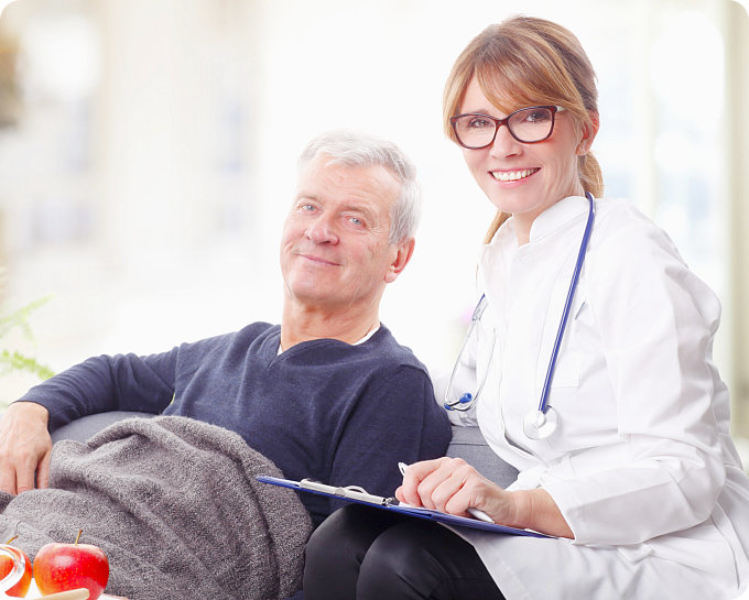 smiling nurse and old man